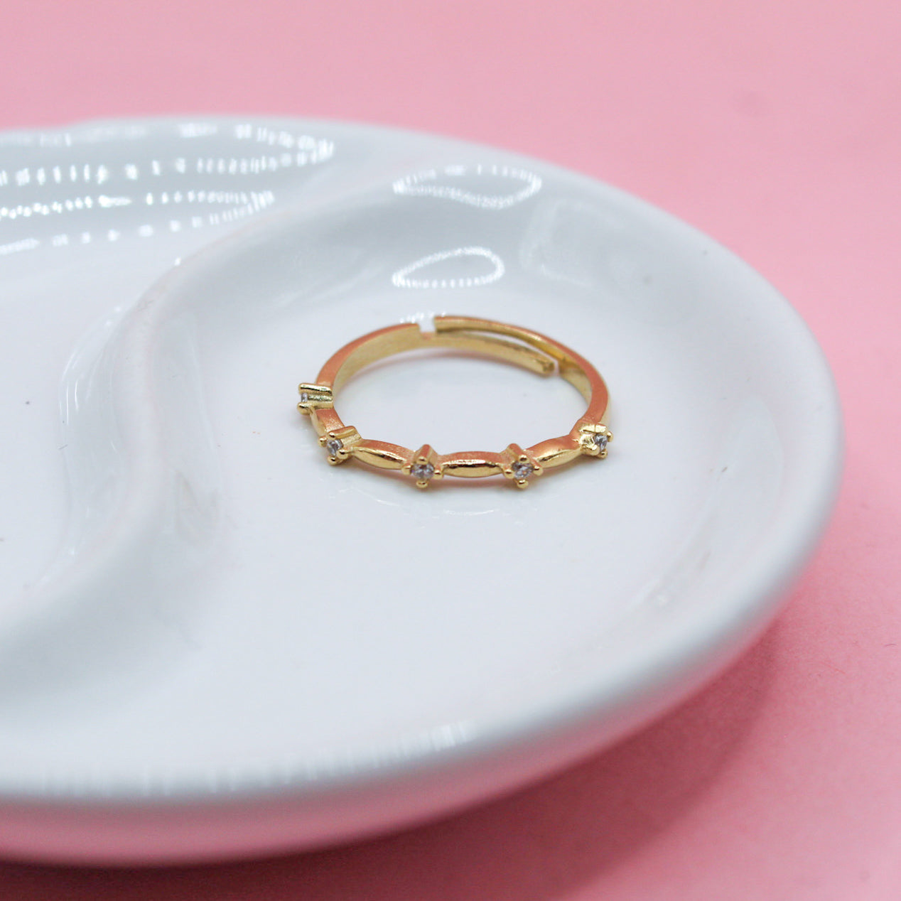 ANILLO CINCO ZIRCONIAS MINI