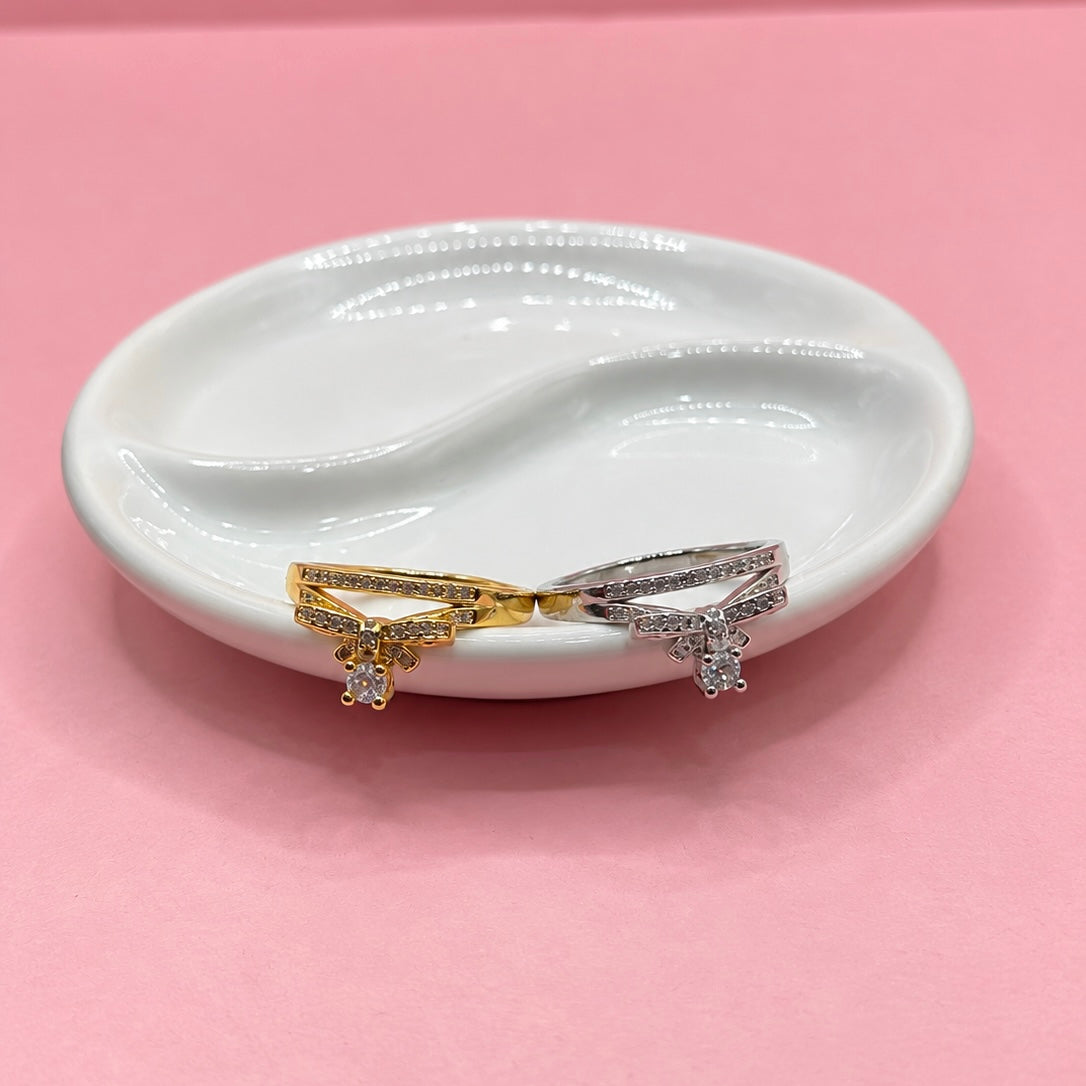 ANILLO DOS BANDAS CON MOÑO Y ZIRCONIA ABAJO