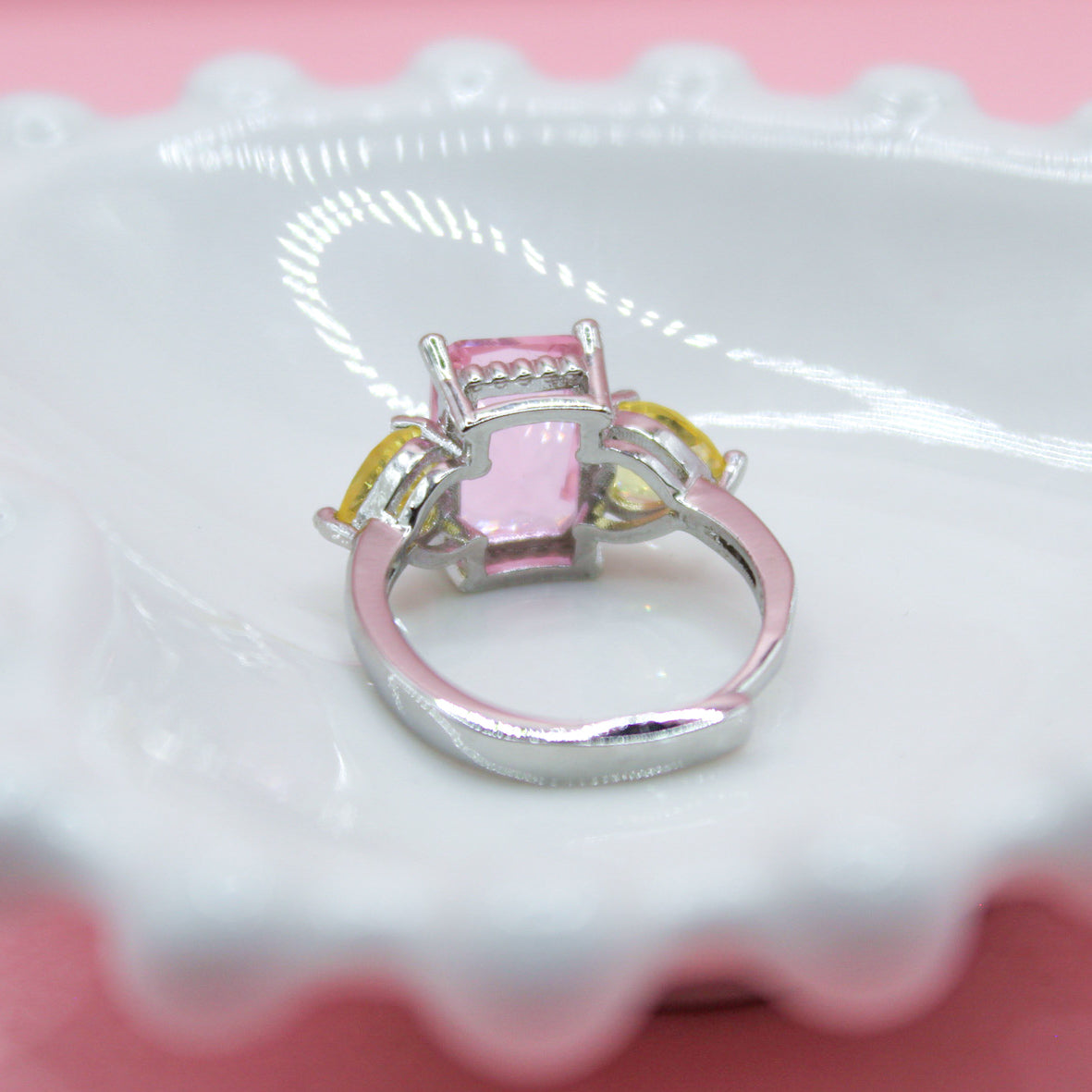 ANILLO ZIRCONIA ROSA Y AMARILLAS PLATEADO