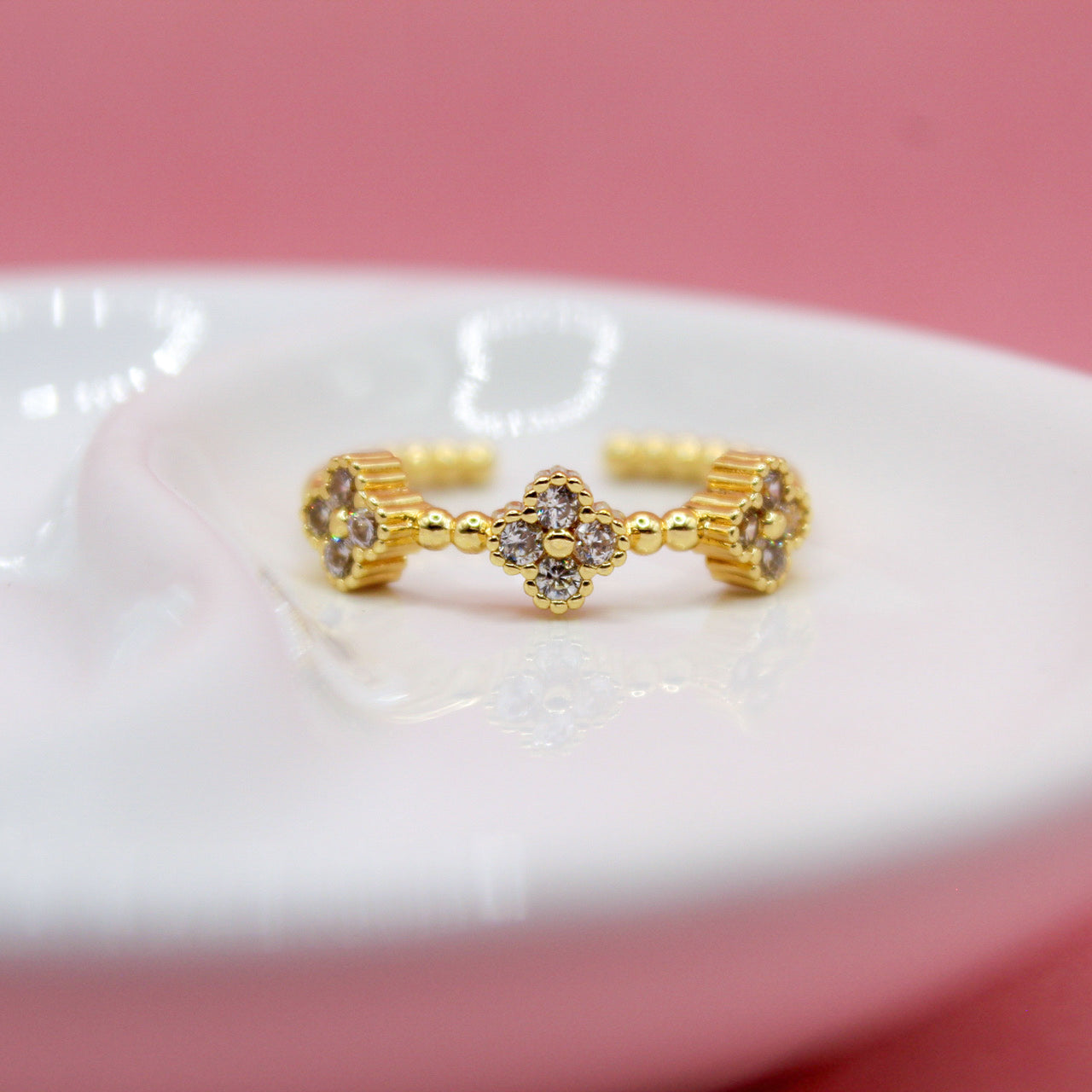 ANILLO TRÉBOL ZIRCONIAS