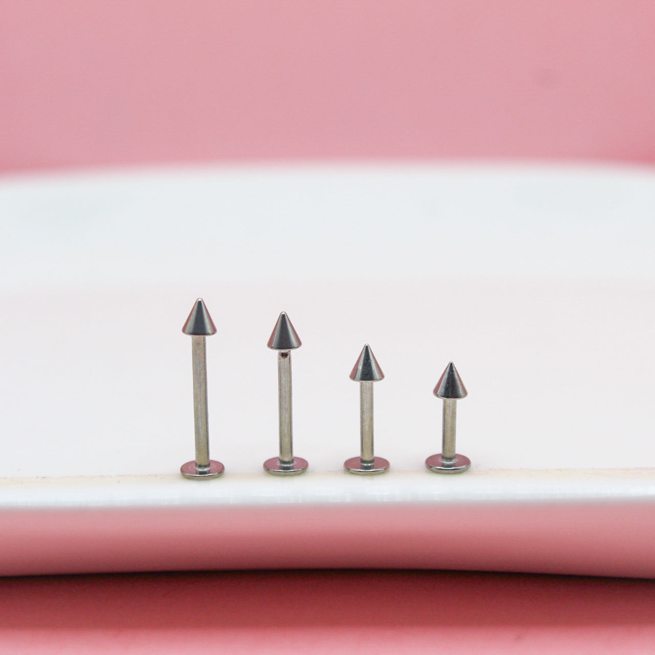 LABRET PLATEADO PICO MEDIANO 316L