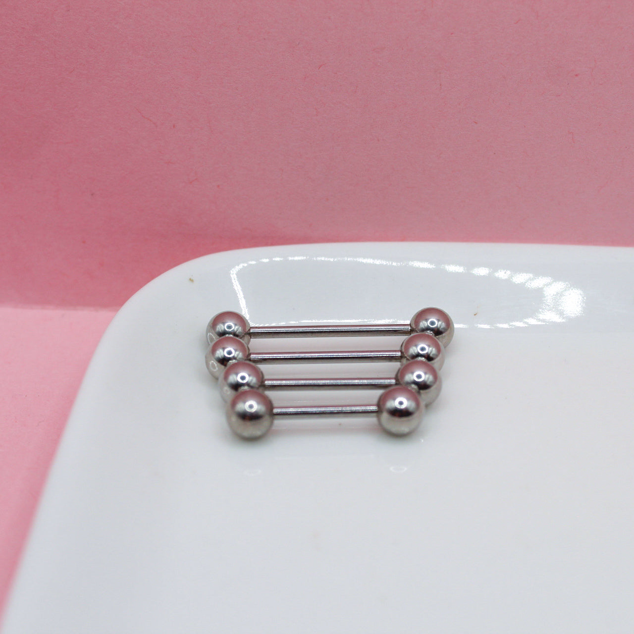 PIERCING RECTO PLATEADO BOLA GRANDE 316L