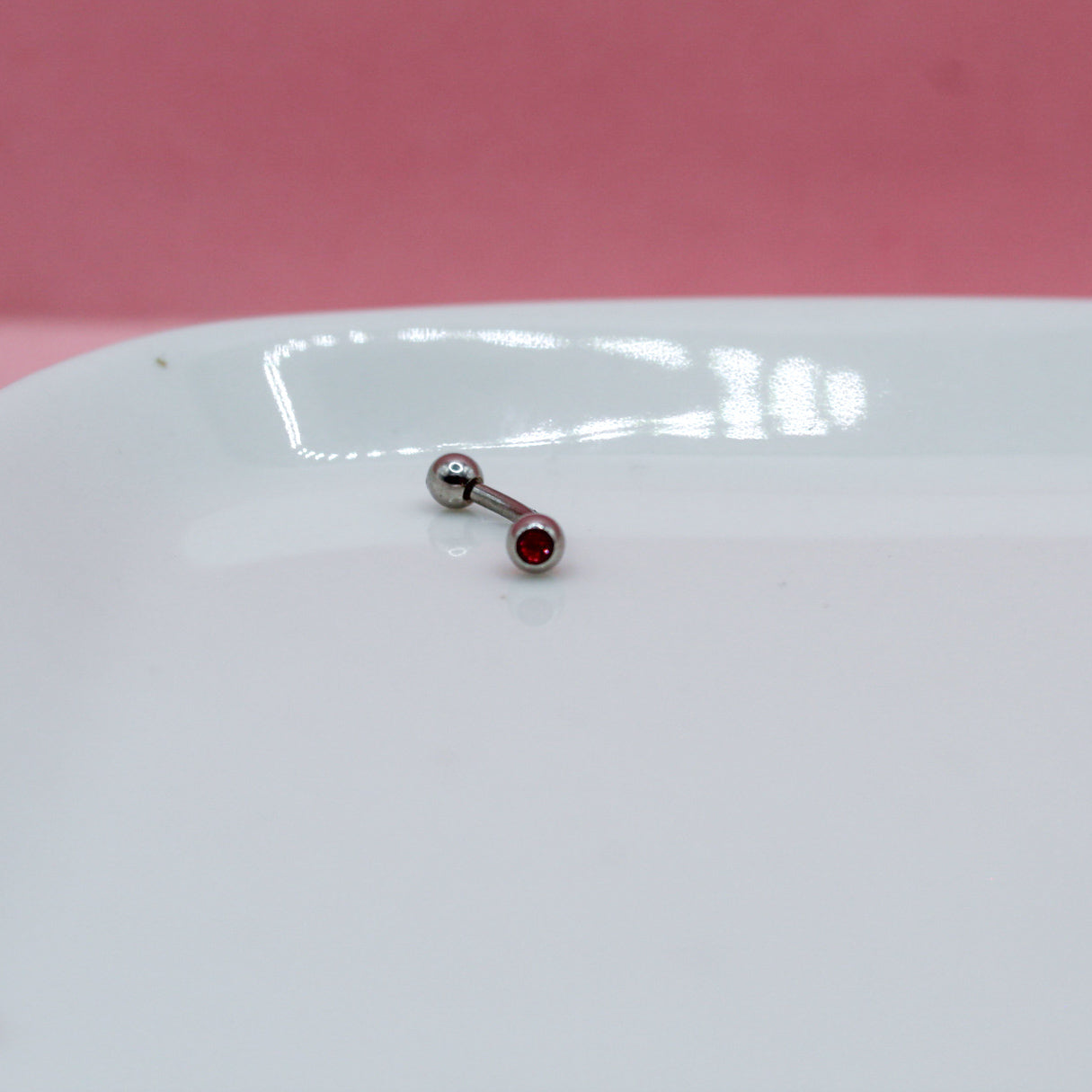 BANANA PLATEADA ZIRCONIA ROSA 316L