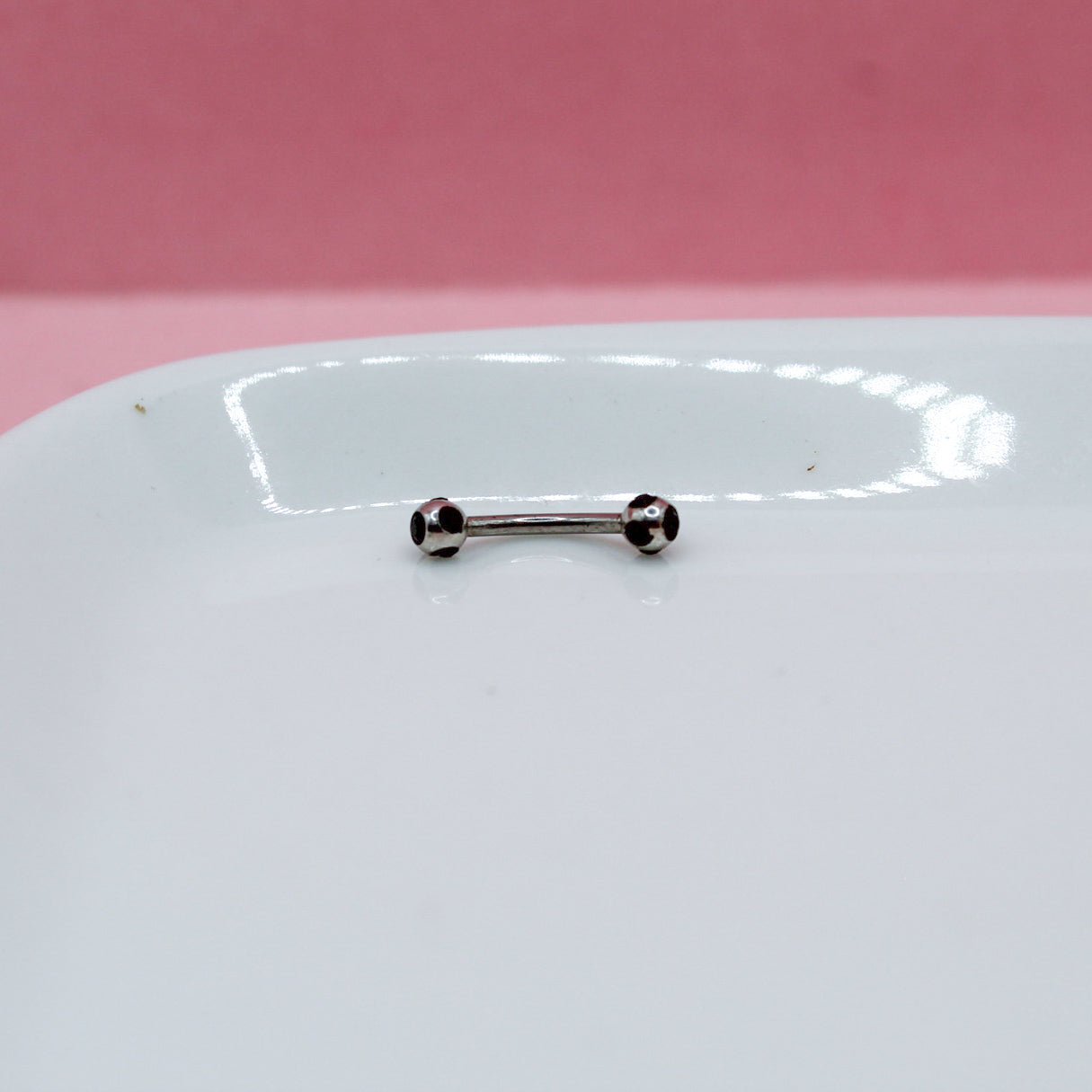 BANANA PLATEADA BOLA ZIRCONIAS NEGRAS 316L