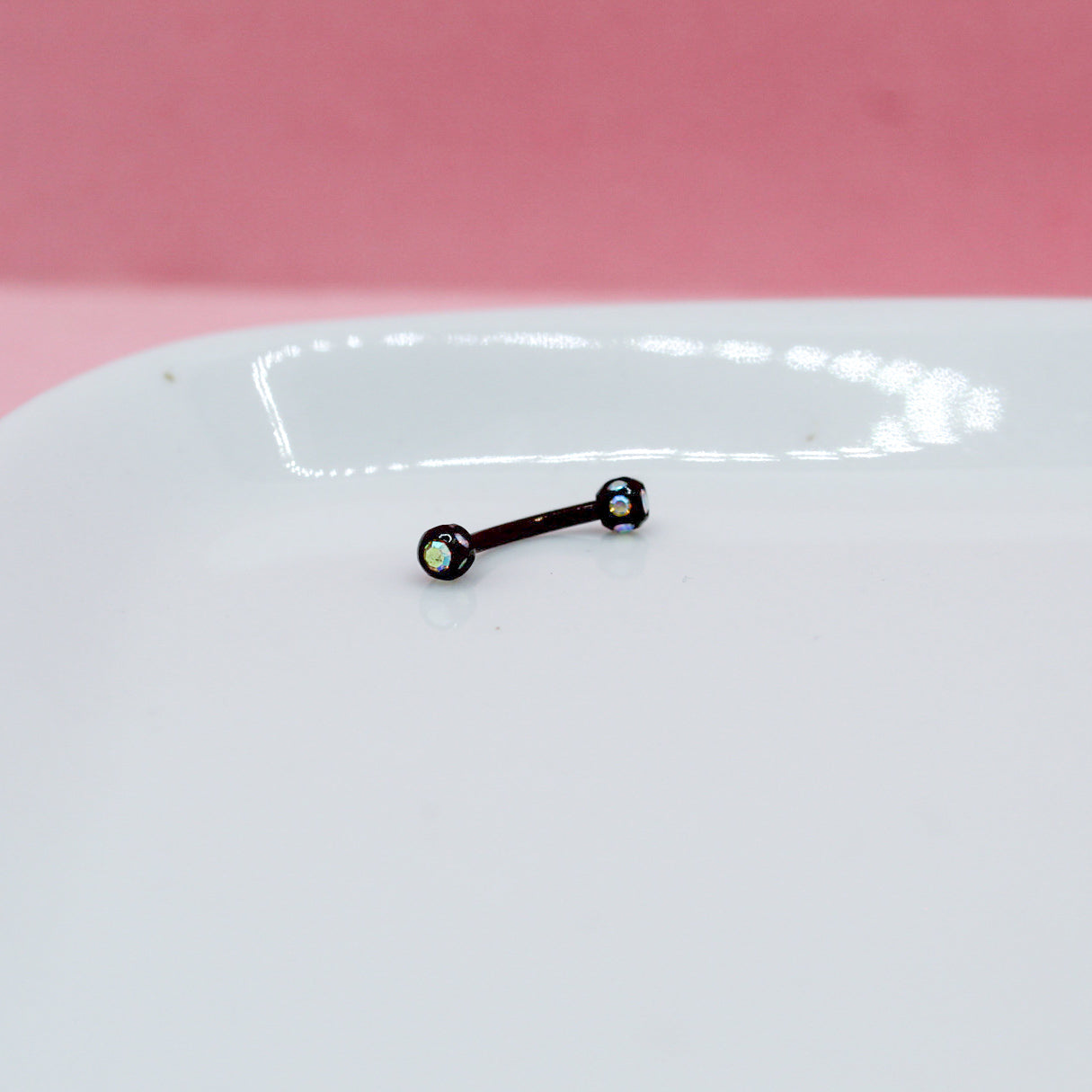 BANANA NEGRA BOLA ZIRCONIAS TORNASOL 316L