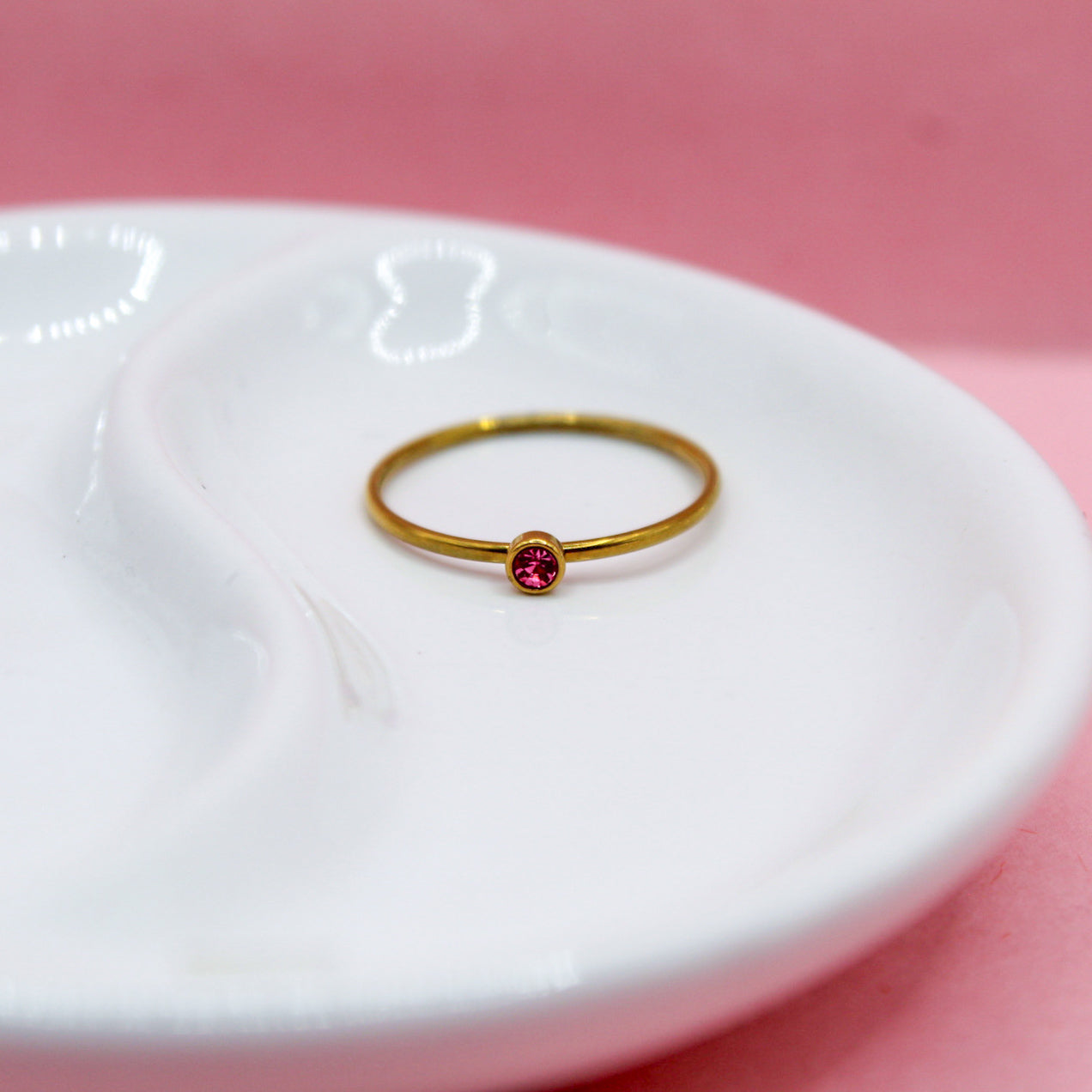 ANILLO ZIRCONIA ROJA BICELADA