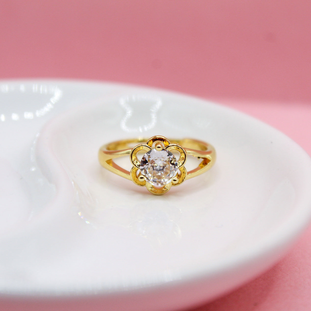 ANILLO ZIRCONIA REDONDA FLOR SILUETA