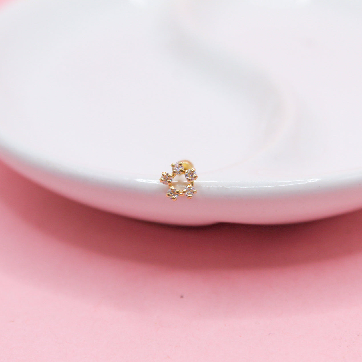 FLOR CINCO ZIRCONIAS SILUETA 10K