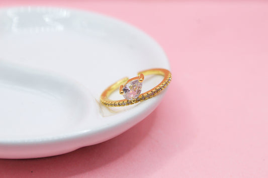 ANILLO ZIRCONIA GOTA DE LADO Y ZIRCONIAS