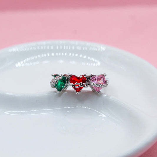 ANILLO PLATEADO CORAZONES VERDE ROJO Y ROSA