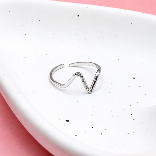 ANILLO CURVA CON ZIRCONIAS