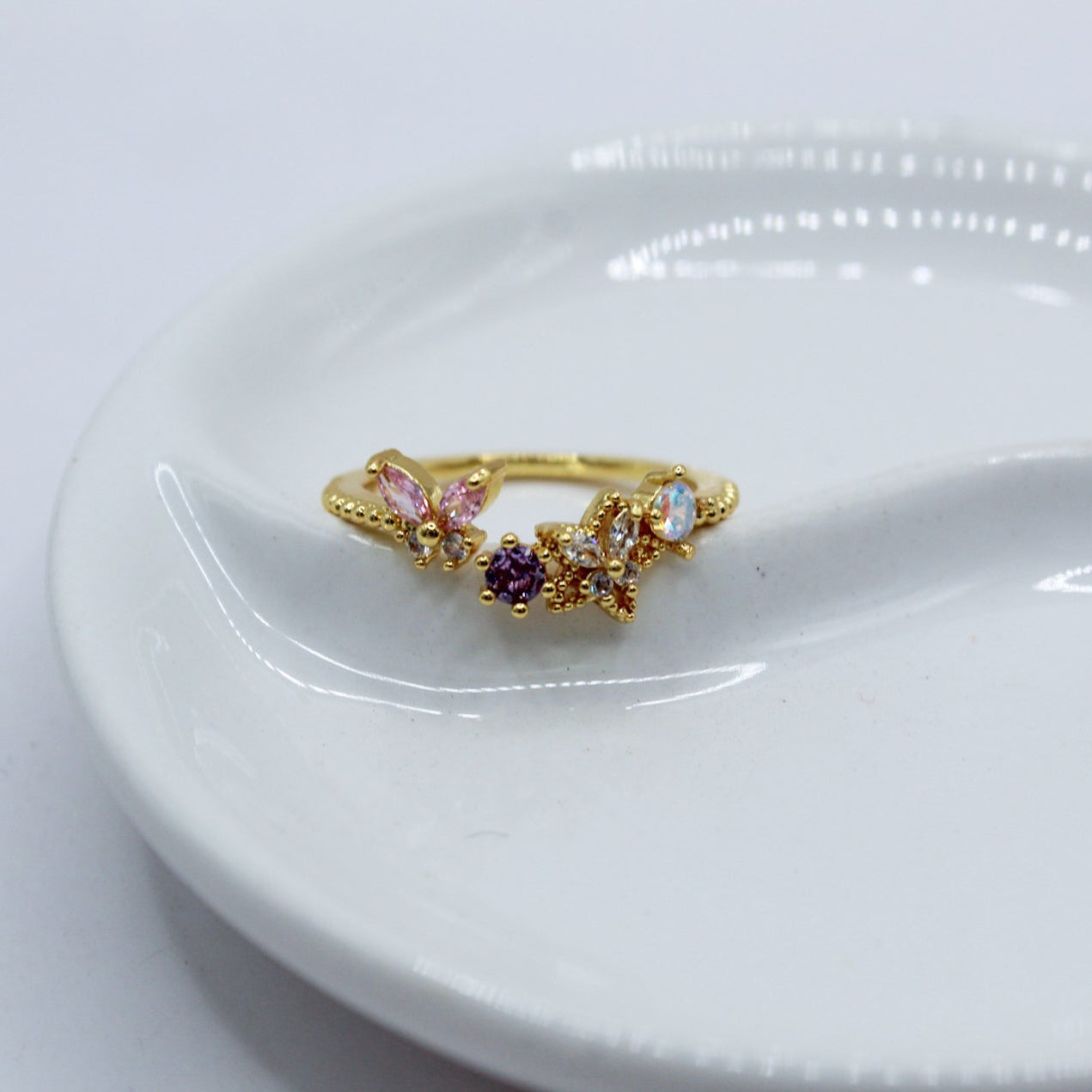 ANILLO MARIPOSA ROSA BLANCO ZIRCONIA MORADA Y TORNASOL