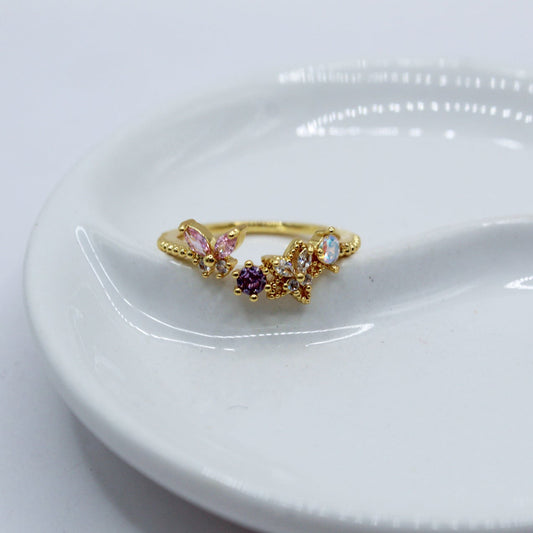 ANILLO MARIPOSA ROSA BLANCO ZIRCONIA MORADA Y TORNASOL