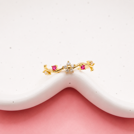 ANILLO FLOR BLANCA Y ZIRCONIAS ROSAS