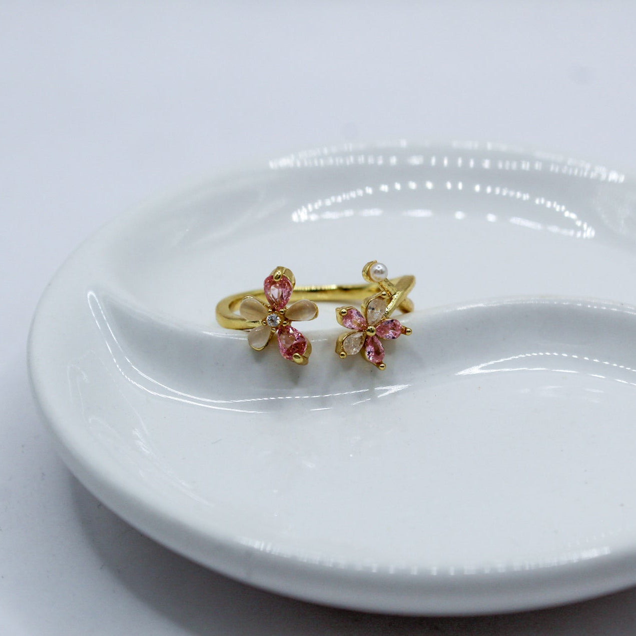 ANILLO DOS FLORES ROSA CON BLANCO