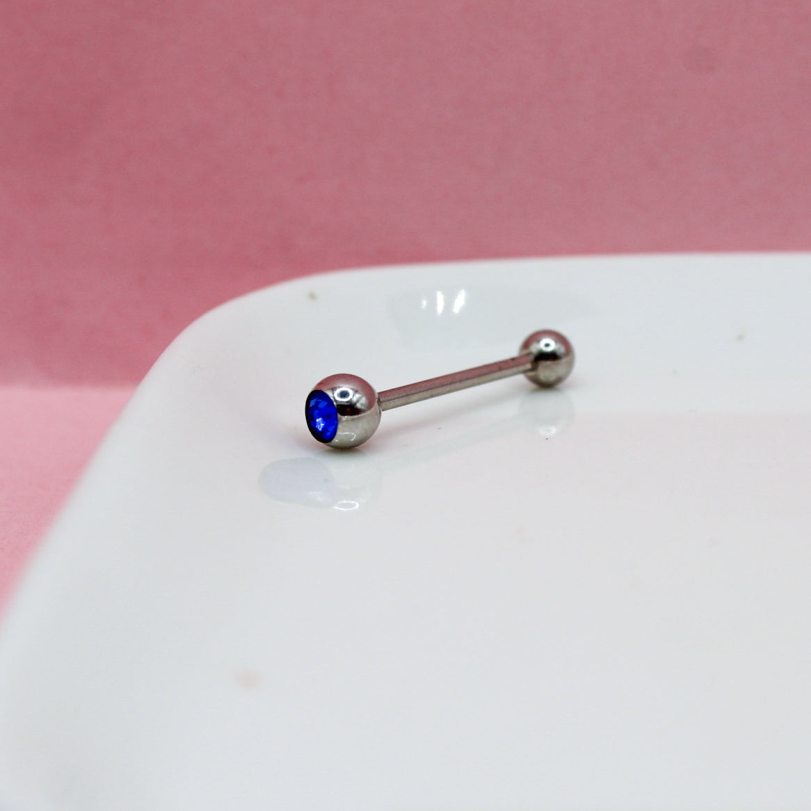 PIERCING RECTO LISO ZIRCONIA AZUL BOLA MEDIANA 316L