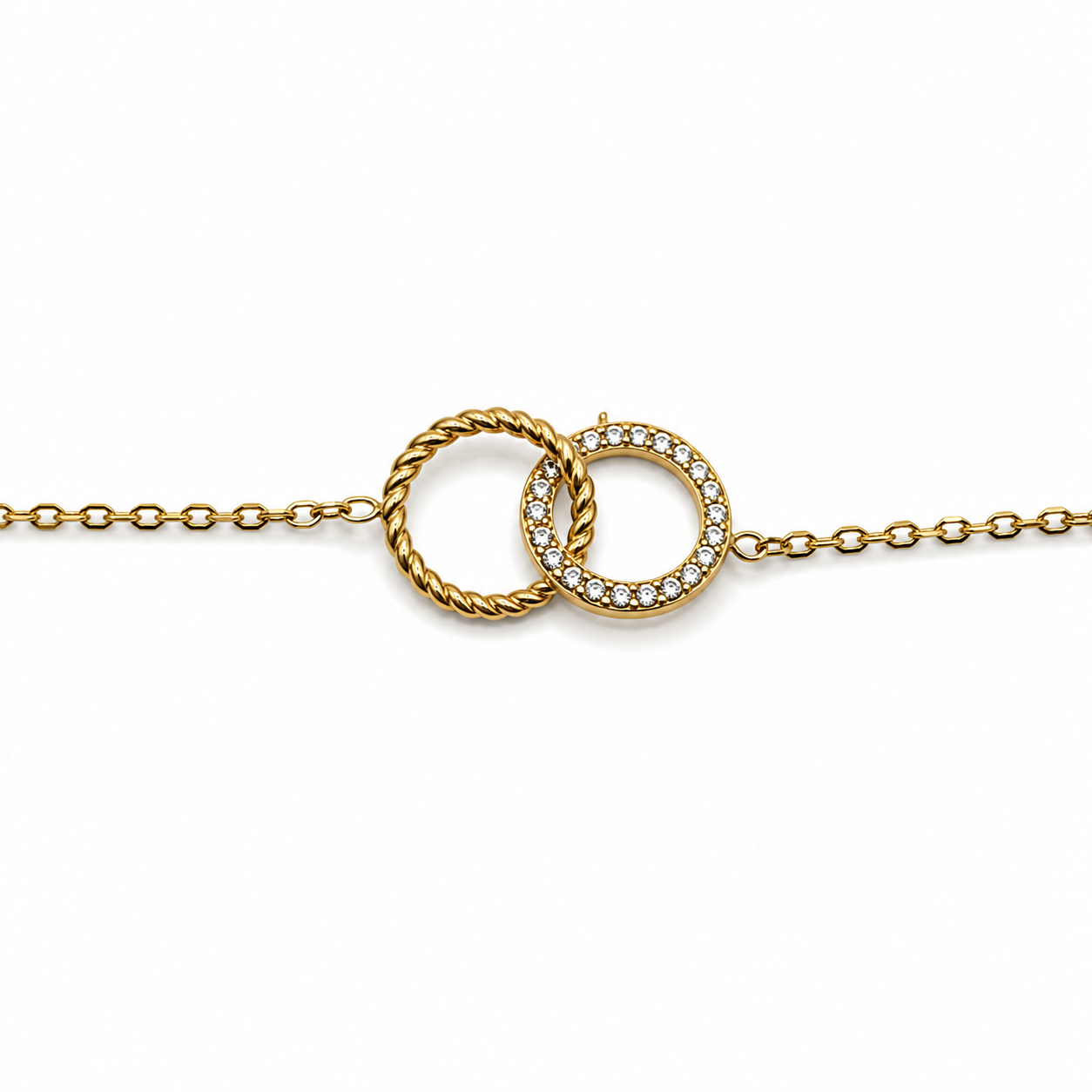 PULSERA DOS CÍRCULOS ZIRCONIAS Y TORCIDO ENTRELAZADOS