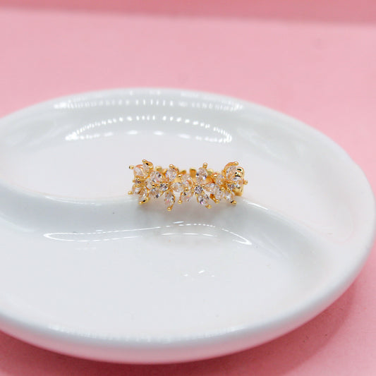 ANILLO FLORES CUATRO DE ZIRCONIAS Y LISAS