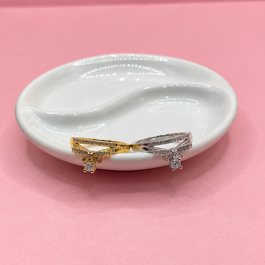 ANILLO DOS BANDAS CON MOÑO Y ZIRCONIA ABAJO
