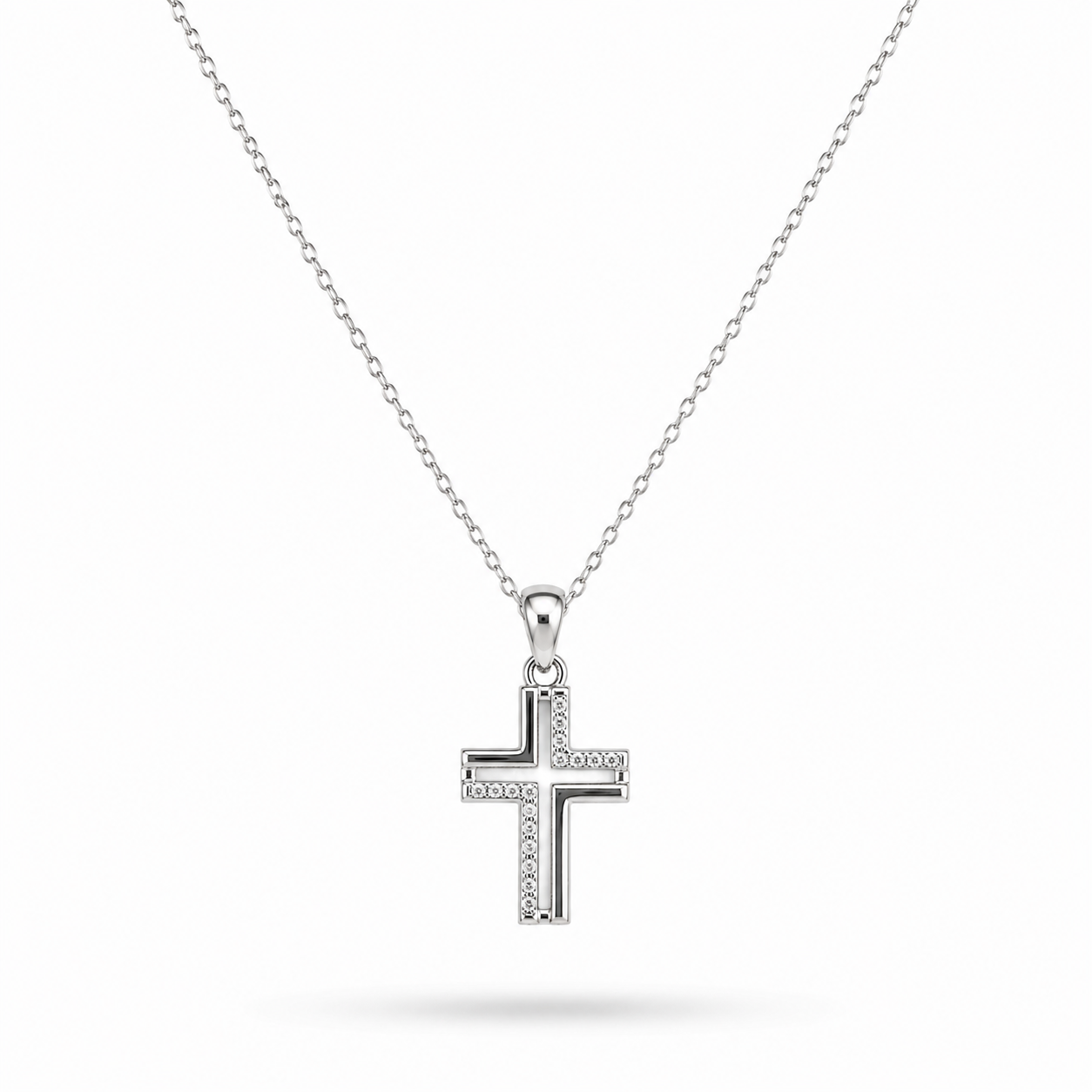 COLLAR CRUZ HUECA CON ZIRCONIAS PLATA .925