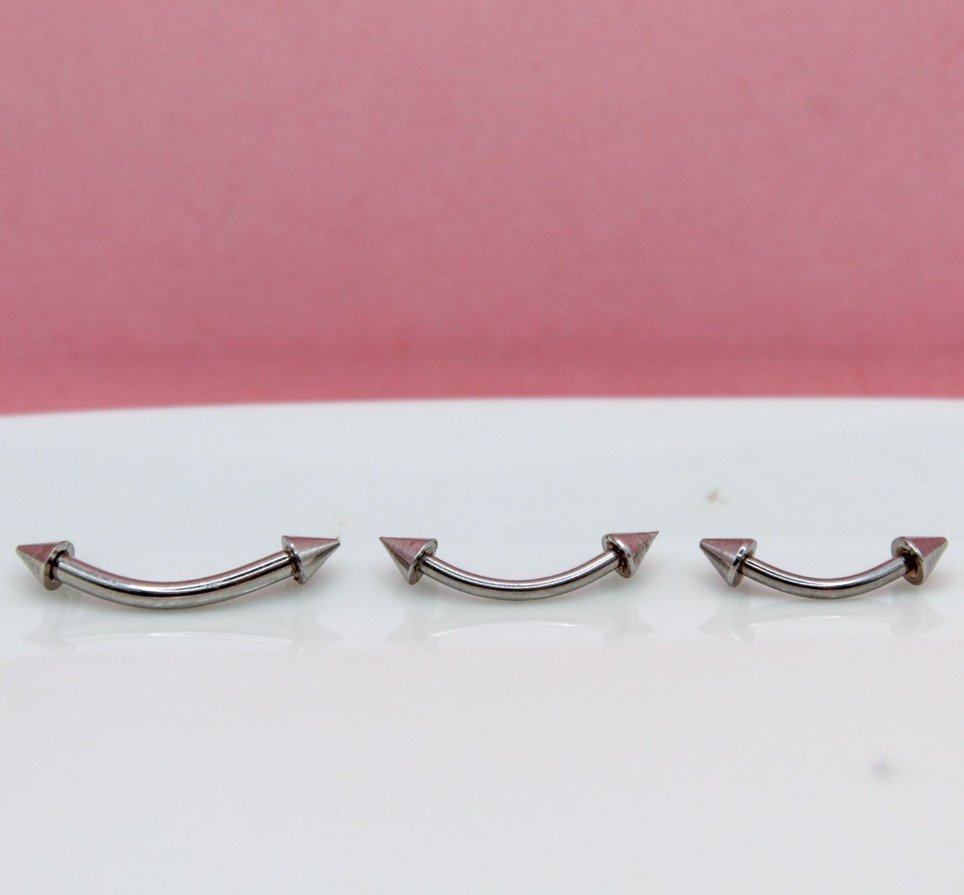 BANANA PLATEADA PICO CHICO 316L