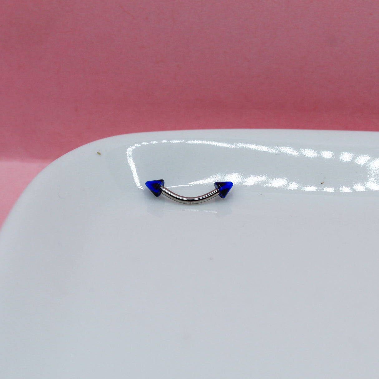 BANANA PLATEADA PICO AZUL PICOS NEGROS 316L