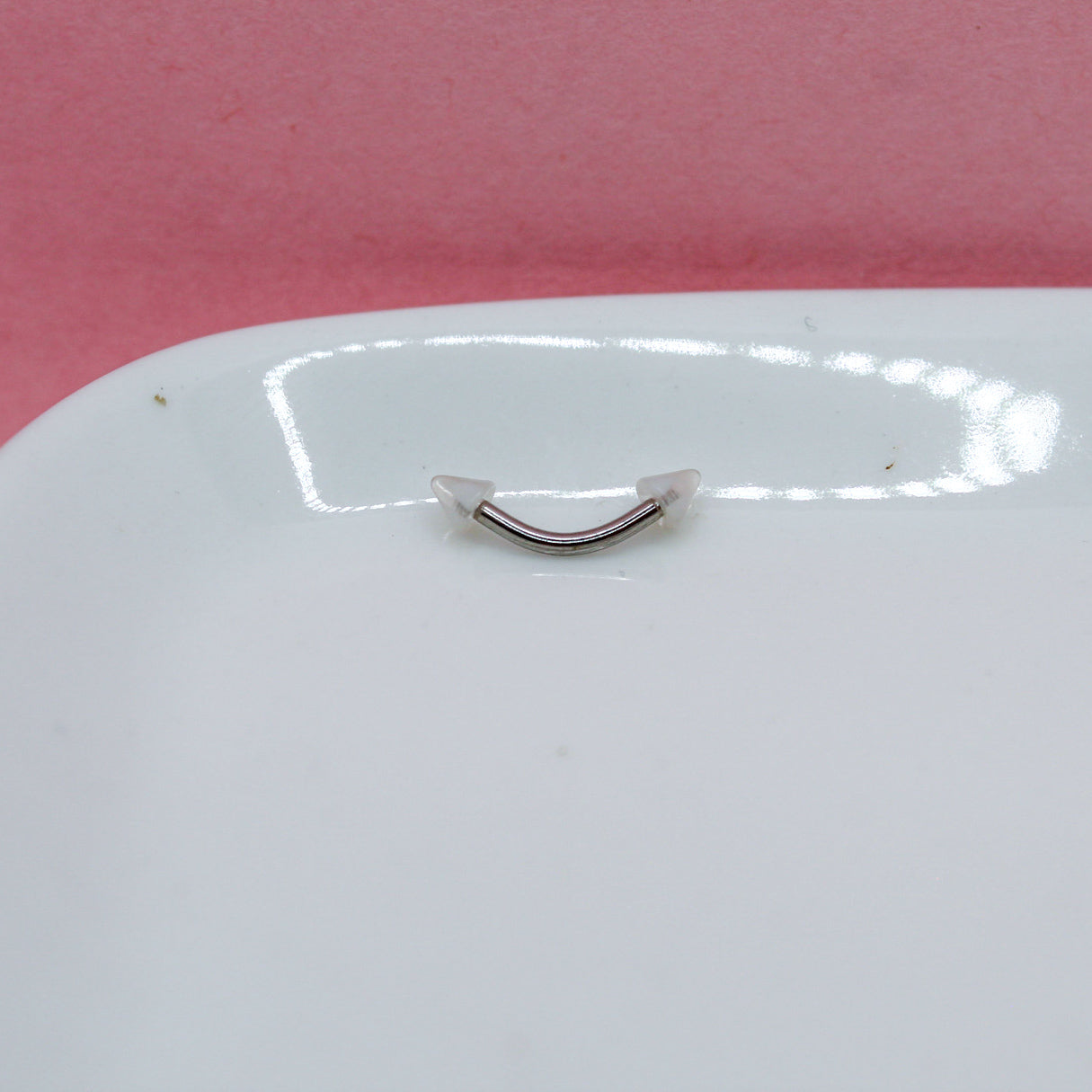 BANANA PLATEADA PICO TRANSPARENTES PICOS BLANCOS 316L