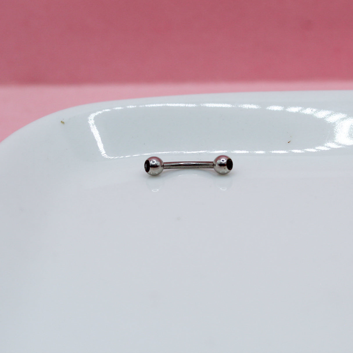 BANANA PLATEADA ZIRCONIA NEGRA 316L