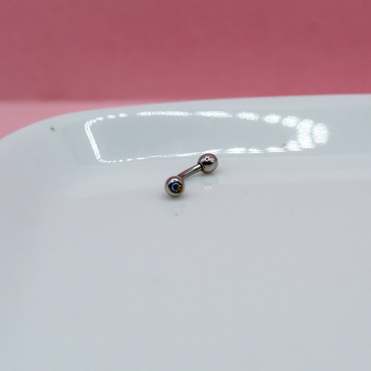 BANANA PLATEADA ZIRCONIA TORNASOL 316L