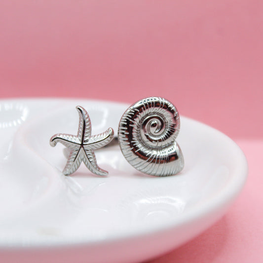 ANILLO CONCHA CON ESTRELLA DE MAR