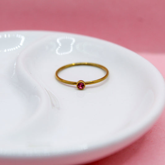 ANILLO ZIRCONIA ROJA BICELADA