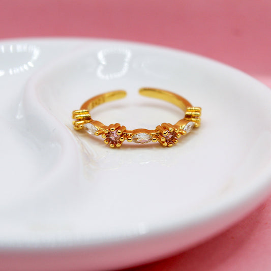 ANILLO ZIRCONIAS OVLADAS CON ZIRCONIAS ROSAS