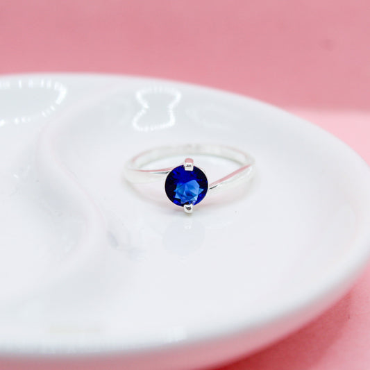 ANILLO ZIRCONIA AZUL REDONDA BANDA LISA TORCIDA .925