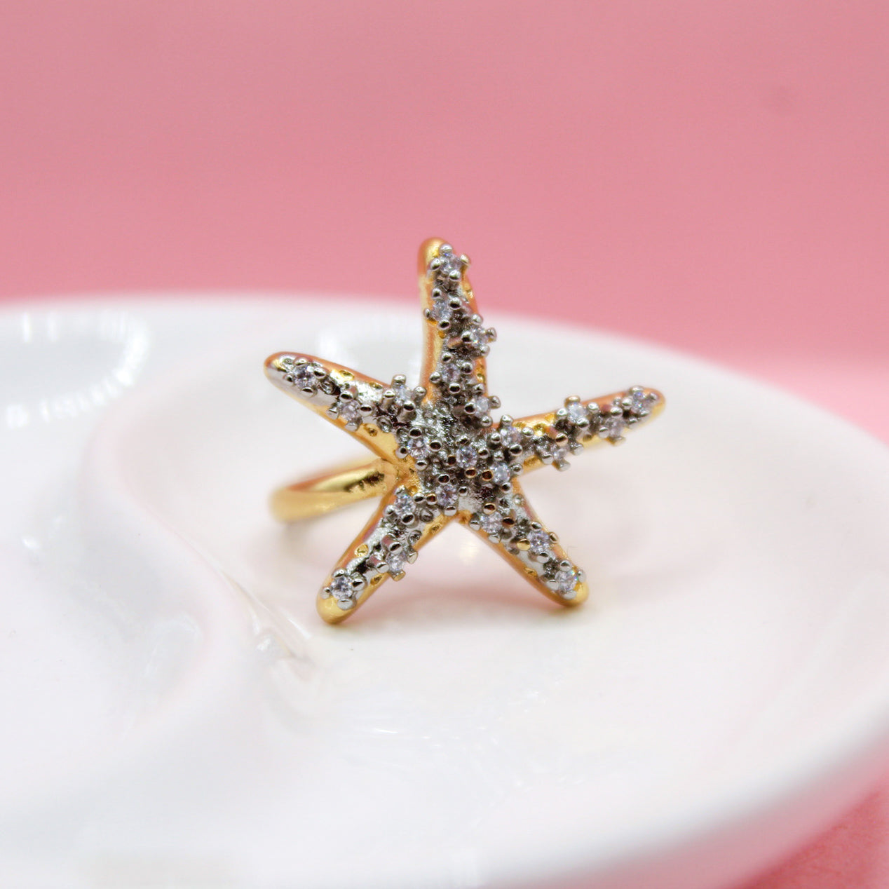 ANILLO ESTRELLA DE MAR CON ZIRCONIAS