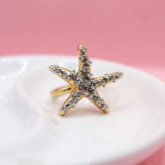 ANILLO ESTRELLA DE MAR CON ZIRCONIAS