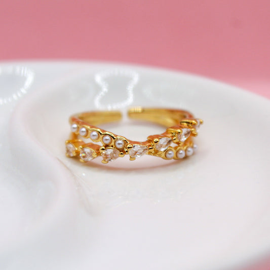 ANILLO X CON PERLAS Y ZIRCONIAS