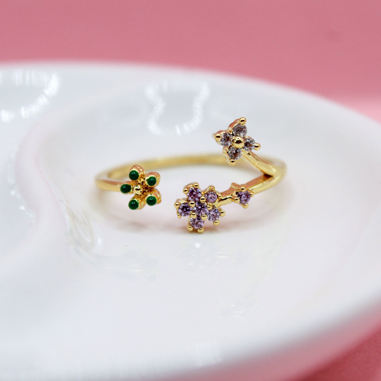 ANILLO FLORES DE ZIRCONIAS MORADAS Y VERDES