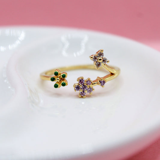 ANILLO FLORES DE ZIRCONIAS MORADAS Y VERDES