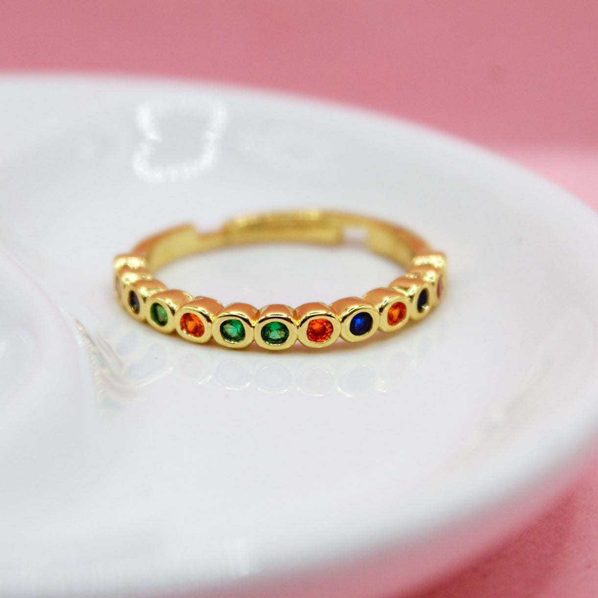 ANILLO ZIRCONIAS COLORES BICELADAS