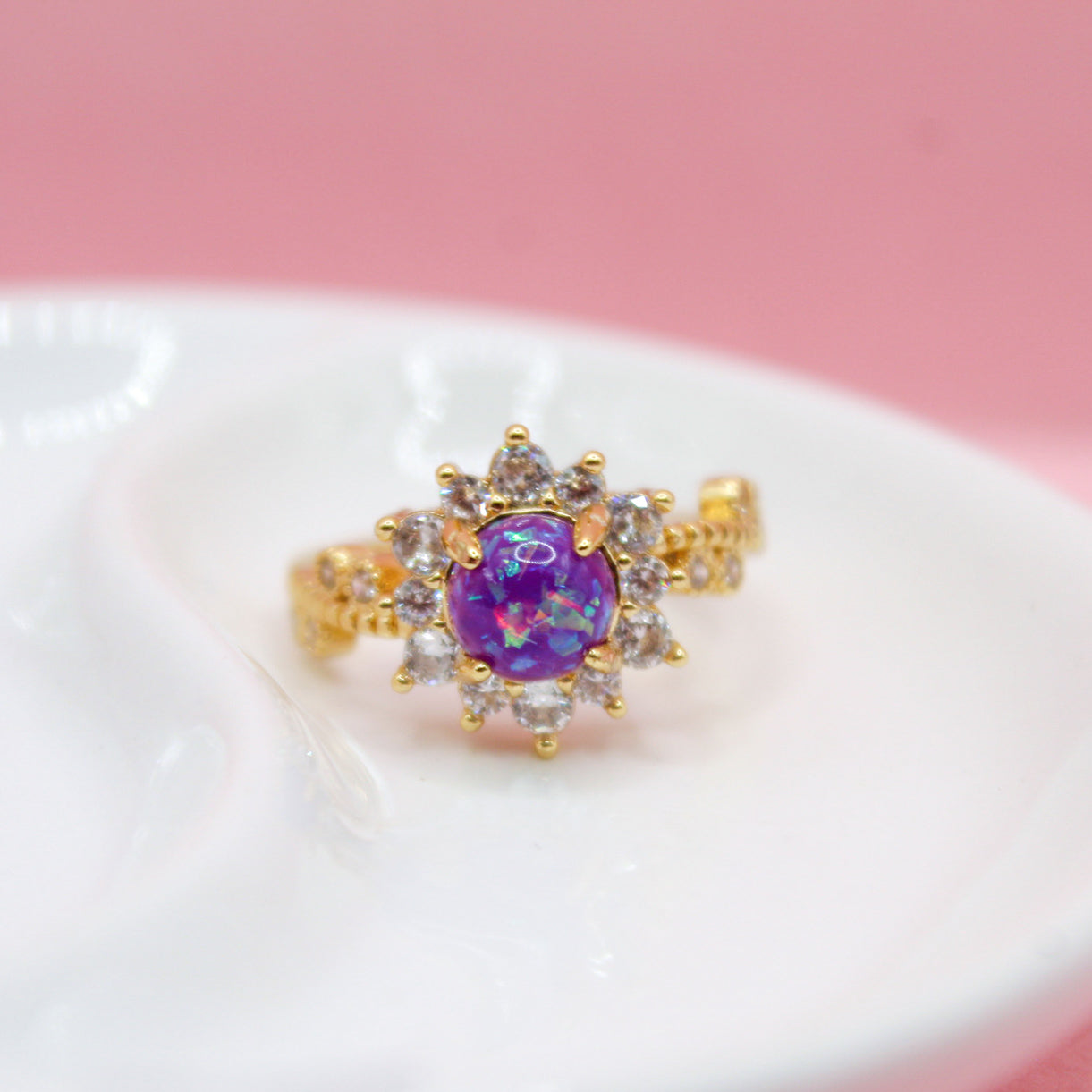 ANILLO PIEDRA MORADA CON ZIRCONIAS