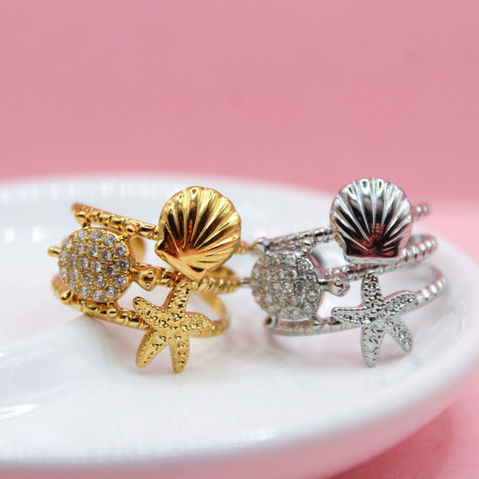ANILLO TORTUGA, CONCHA Y ESTRELLA DE MAR