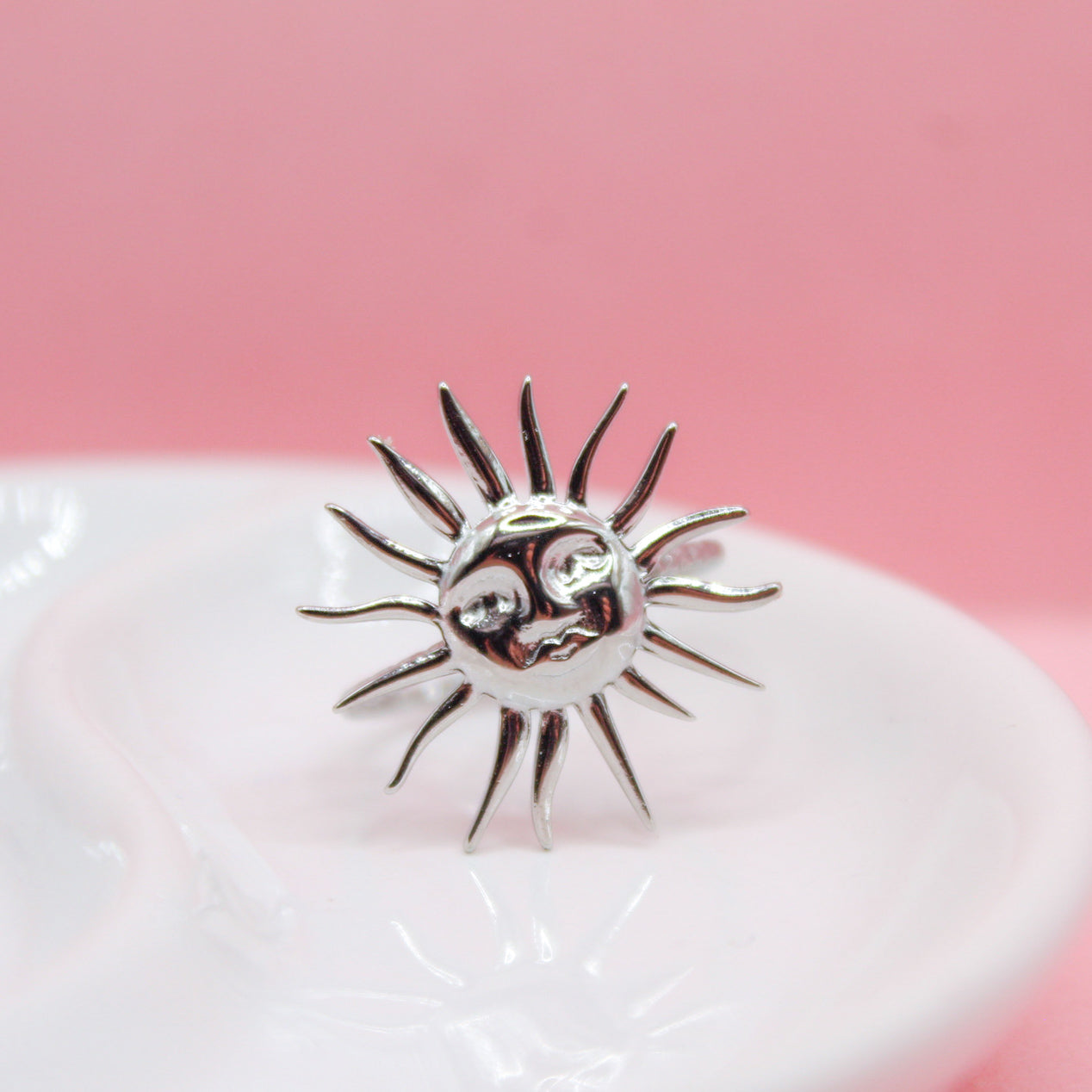 ANILLO PLATEADO SOL CON CARA