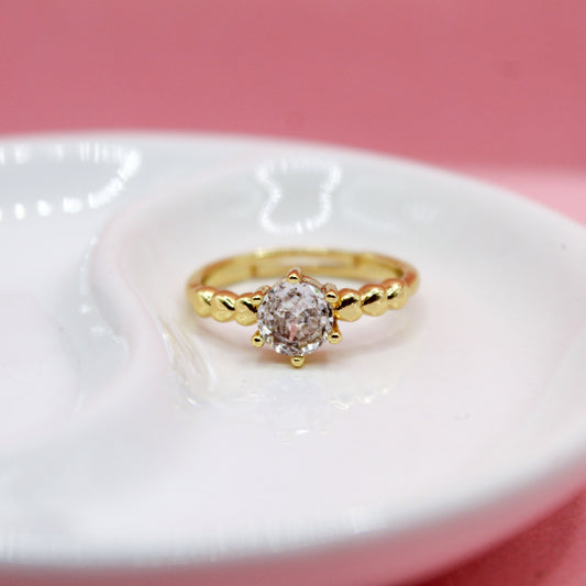 ANILLO ZIRCONIA REDONDA TRES CORAZONES LISOS