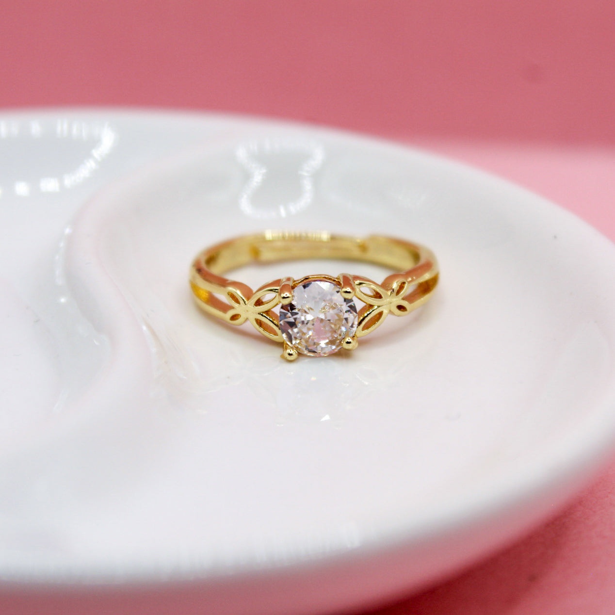 ANILLO ZIRCONIA REDONDA BANDA MARIPOSA