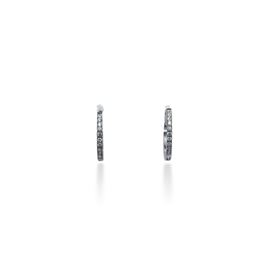 ARRACADA DELGADA PLATEADA MITAD ZIRCONIAS CIRCULARES