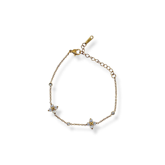 PULSERA FLOR ZIRCONIAS Y TRES ZIRCONIAS